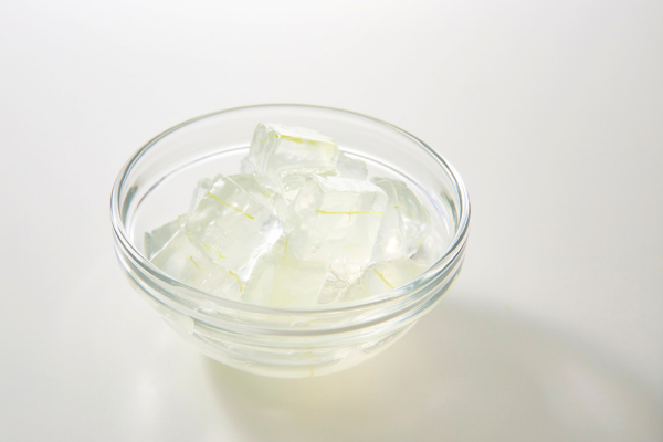 small bowl of clear candle-making gel